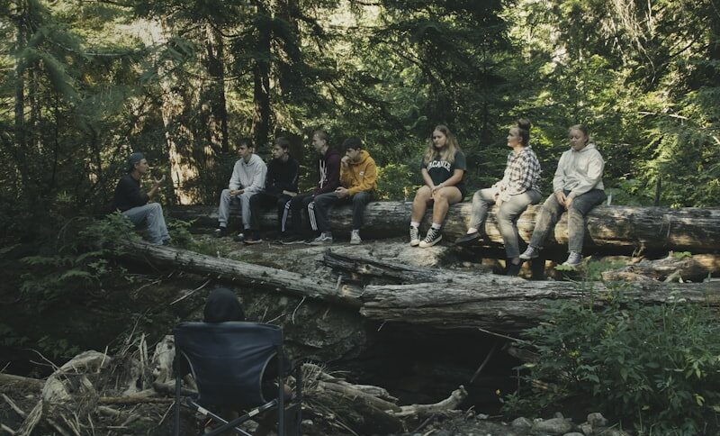 Team enjoying corporate retreat in natural setting