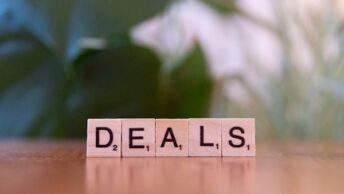 Business professionals analysing failed acquisition